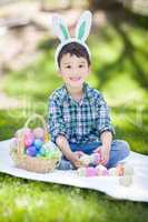 Mixed Race Chinese and Caucasian Baby Boy Outside Wearing Rabbit