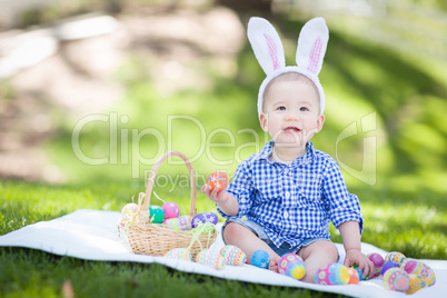 Mixed Race Chinese and Caucasian Baby Boy Outside Wearing Rabbit