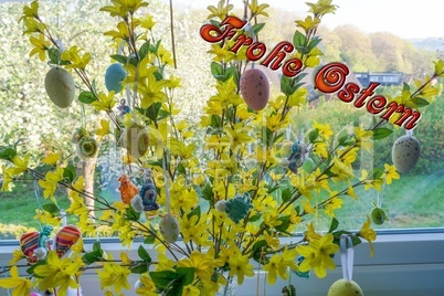 Easter eggs at a forsythia