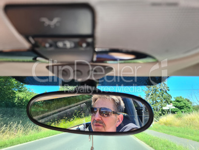 Mirror in the Car, on the Street