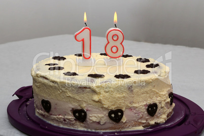 An image of a birthday cake with candle - 18