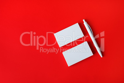 Blank business cards, pen