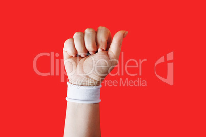 Clenched fist female hand
