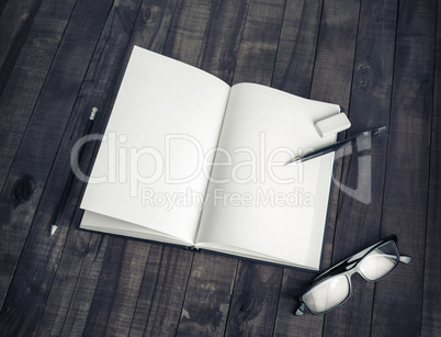 Book, pencil, glasses, eraser