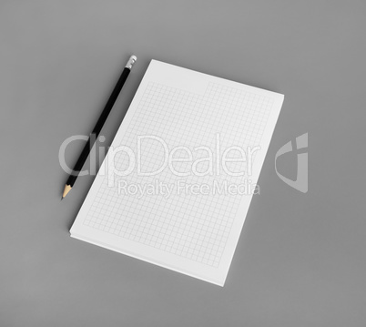 Blank notepad, pencil