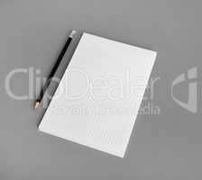 Blank notepad, pencil