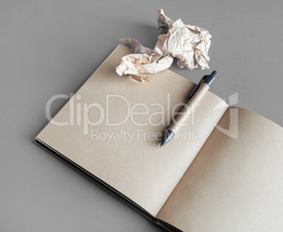 Sketchbook, crumpled paper, pen