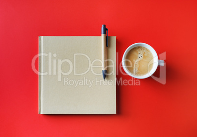 Booklet, pen, coffee cup