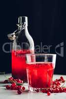 Glass of infused water with red currant