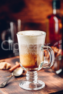 Irish coffee in drinking glass