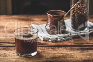 Freshly brewed turkish coffee in drinking glass
