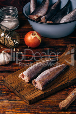 Hake carcasses on cutting board