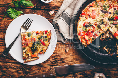 Vegetable frittata with broccoli and red bell pepper