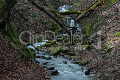 Time exposure of the little river called Helle in the german city Winterberg