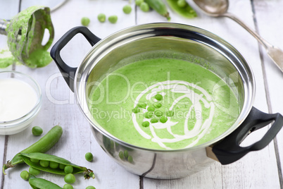 Saucepan with mashed pea soup