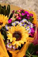 Yellow sunflower and Purple bouquet of flowers
