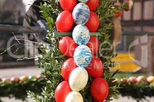 Colored decorative eggs are used to decorate wells in Germany for Easter