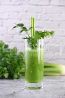 Glass of freshly made celery smoothie.