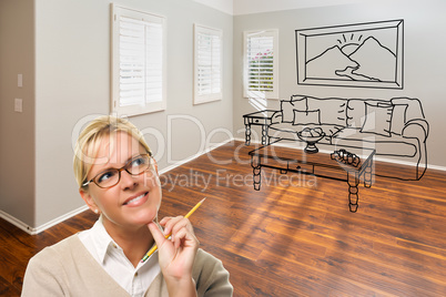 Woman With Pencil In Empty Room of New House with Couch and Tabl