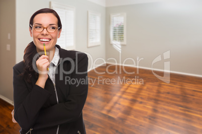 Woman With Pencil In Empty Room of New House