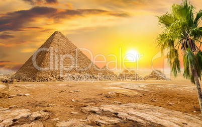 Pyramids and sun