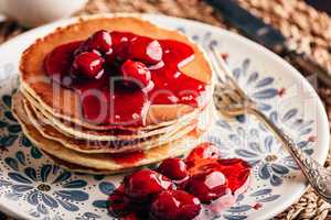 Stack of pancakes with dogwood berry marmalade