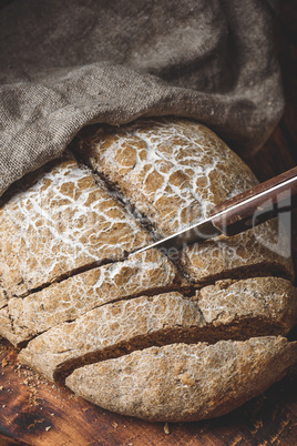 Sliced rye bread with knife