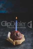 Chocolate muffin with birthday candle