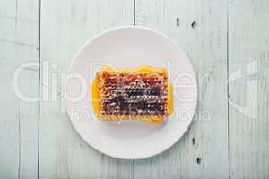 Honeycomb on white plate