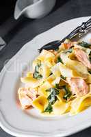 Tagliatelle with salmon and spinach in a cream sauce
