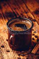 Brewed black coffee in metal mug