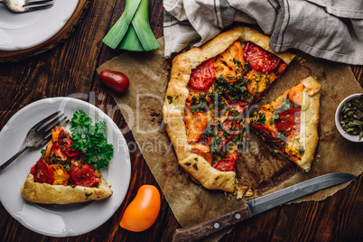 Sliced tomato galette on baking paper