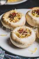 Button mushrooms stuffed with cheese and spices