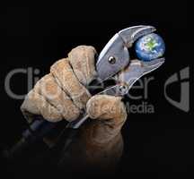 Worker In Construction Gloves Holding Planet Earth with  Vise-gr
