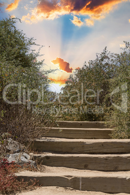 Rustic steps lead up to a sunrise in Big Sur,