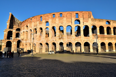 Rome, Italy - December 13th 2020: View of the Coliseum with few tourists due to the Covid19 epidemic