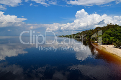 Sky reflection on Rio Negro waters, Amazon.