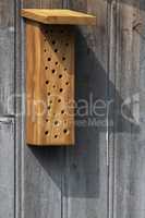 Insect hotel made of residual wood.