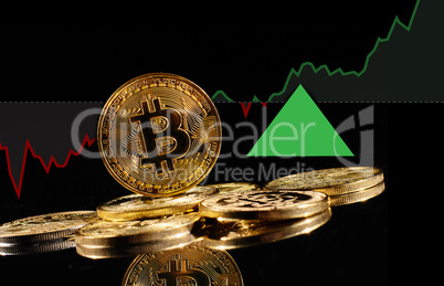 Golden coins with bitcoin logo rise in bull market. Leader cryptocurrency Bitcoin BTC go up in trading. Price of decentralized digital currency is growing up. Electronic money on black background