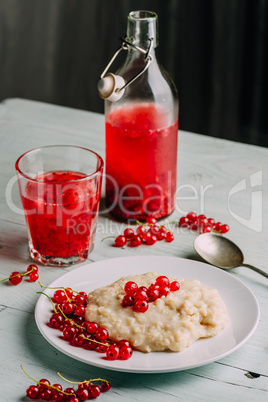 Simple breakfast with porridge and infused water