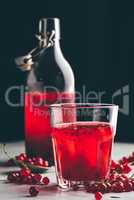 Glass of infused water with red currant