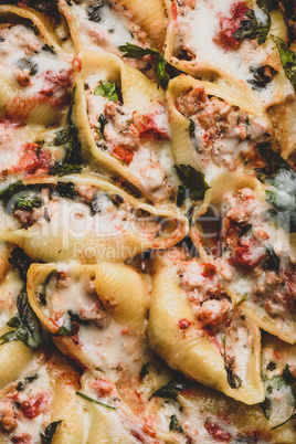 Pasta stuffed with ground beef, spinach and cheese