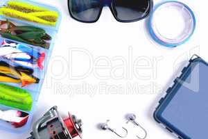 fishing accessories, box with silicone baits, fishing glasses, a