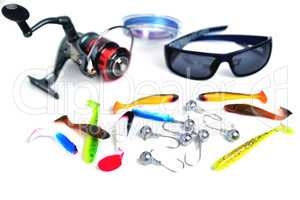 different accessories for fishing, glasses, silicone bait, reel,