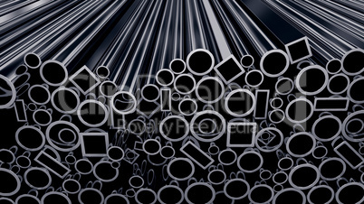 Stack of steel pipes on black