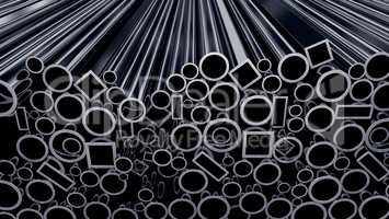 Stack of steel pipes on black