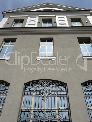 windows of building with grid at day