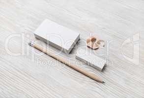 Business card, pencil, eraser