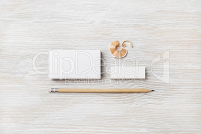 Business card, pencil and eraser
