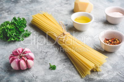 Raw ingredients for linguine with olive oil and garlic